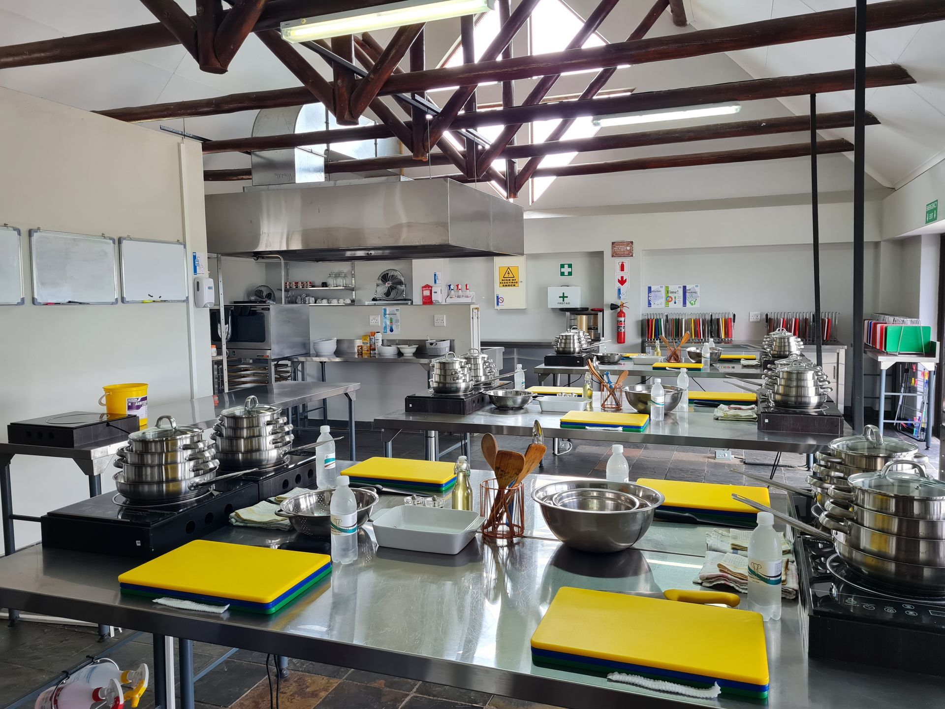 a kitchen with a sign that says ' emergency exit ' on it